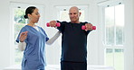 Dumbbells, fitness or recovery with a caregiver and old man in a retirement home for physiotherapy or rehabilitation. Exercise, health or training with a woman nurse and senior patient in a house