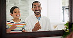 Father, mirror or boy in bathroom brushing teeth for development in morning at family home. Learning, happy dad or kid cleaning mouth with toothbrush for dental care, wash or oral health with parent