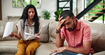 Documents, stress for tax and couple with financial crisis on sofa in living room of home for problem solving. Debt, anxiety or bankruptcy with worried man and woman in apartment for depression