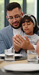 Father, kid praying or Muslim family at table to say dua for breaking fast on holy month of Ramadan. Religion, gratitude or Islamic dad with girl child for Eid dinner, lunch or iftar meal at home