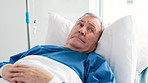 Senior man, hospital and thinking in bed with cancer, illness or sick with memory of life decision. Elderly patient, person and remember with ideas, rest or fear in retirement with anxiety in clinic