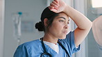 Woman, nurse and stress by window at hospital in depression for mistake, fatigue or mental health. Face of frustrated female person, scrub or medical employee looking out glass in anxiety at clinic