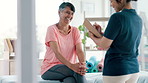 Mature, checklist or happy woman in physiotherapy with a physiotherapist, injury info or clipboard. Rehabilitation, reflexology or patient talking for trauma evaluation with a doctor writing notes