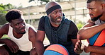 Black man, teamwork or huddle for motivation on basketball court planning a strategy or mission. Training game, coaching people or athletes in group for talking, fitness or support in a sports match