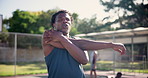 Sports, basketball and athlete stretching arms for training, game or match on outdoor court. Fitness, team and group of young African male people with warm up workout or exercise on outside pitch.