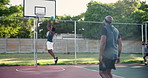 Men, basketball player and outdoor for sport, dribble and speed with fitness, training or competition. Black people, athlete and games with steps, jump and points for contest, slam dunk or exercise