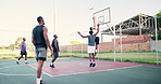 Basketball court, goal and men or friends outdoor for training or exercise for fitness. Group or team of black male athlete players in game or sports competition with ball, jump and dunk in basket