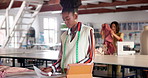 Fashion, thinking and woman with design sketch for creative small business owner in workshop. Ideas, tailor or professional designer with paperwork, planning and manufacturing clothes at startup.