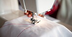 Sewing, machine and hands of tailor with fabric in creative production of clothes or fashion. Sewer, needle and person in textile factory with cotton thread for stitches on cloth and manufacturing