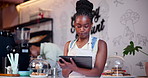 Tablet, ecommerce and black woman in coffee shop for online order in small business startup as owner or employee. Tech, inventory and young waitress or barista in cafe for hospitality and service