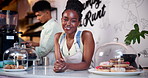 Happy, black woman and professional barista at cafe in customer service with apron at coffee shop. Portrait of African person, waitress or owner smile in small business or management at restaurant