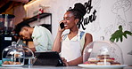 Cafe, woman and talking with tablet in phone call for online order in food delivery, takeaway or small business. Virtual, client and contact cashier for services at coffee shop with African barista