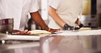 Cooking, dough and hands in kitchen at bakery with food, production and bread in small business. Restaurant, staff and baker closeup with pastry, dessert or preparation of catering in cafe on table
