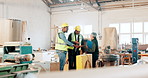 People, shaking hands and agreement in warehouse for construction, project and b2b deal. Manufacturing, workshop and handshake for collaboration on industrial business and commitment to cooperation