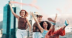Friends, fashion and women in city with smoke for freedom, adventure and fun together. Happy, excited and people running with shopping cart, flare and color gas in street with trendy clothes or style