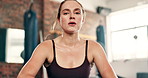 Gym, fitness and face of woman in workout, exercise or training break for challenge, boxing or practice with cool fan. Serious portrait of boxer breathing, sweating and tired for endurance and health