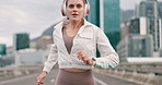 Runner, cardio and outdoors on road, city and sportswear with headphones. Person, breathe and active for fitness, clouds and health from exercising, active and sporty, training and keeping fit