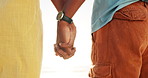 Holding hands, love and closeup of couple at beach for romantic valentines day weekend trip. Care, unity and zoom of African man and woman by tropical ocean or sea for travel, vacation or holiday.