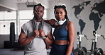 Gym, fitness and face of people for team workout, exercise and ready for challenge or training confidence. Portrait of young black woman and personal trainer with headphones, support and workout gear