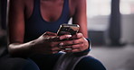 Woman, hands and phone in fitness for communication, social media or typing on sports app at gym. Closeup of female person or athlete on mobile smartphone for online chatting or texting on break