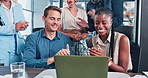 Happy, business and people with laptop in applause or celebration for teamwork, bonus or promotion at office. Group of young excited employees clapping hands for success, good news or achievement