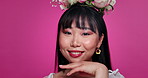 Face, beauty and Asian woman with flower crown, smile and studio isolated on a pink background. Portrait, wreath and floral cosmetics of natural Korean model in organic makeup, skincare and mockup