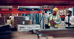 Man, supply chain and team checking storage for inspection, inventory or production in warehouse. Male person, engineer or contractors walking with clipboard and tablet for stock and quality control