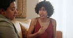 Woman, lesbian couple and fight on sofa for argument, disagreement or confession in living room at home. Young female person, LGBTQ or gay people in conflict, dispute or break up and divorce at house