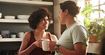 Couple, lgbtq and drinking coffee at home, conversation and bonding or security in relationship. Lesbians, people and communication on weekend in kitchen, tea and care in partnership and hot beverage