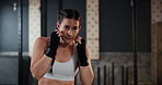 Woman, gym and boxing with training, fitness and practice for a match and sports with endurance. Challenge, person or boxer with workout or girl in a wellness centre or progress with health or energy