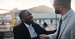 Happy, businessman and handshake in city for partnership, teamwork or outdoor meet and greet. Man, employees or colleagues shaking hands in hug for welcome, thank you or respect in an urban town 