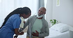 Senior care, nurse and black man with pain in stomach for advice, healthcare and exam on bed. Homecare, abdomen and mature person with caregiver in consultation for medical assessment, check or help.