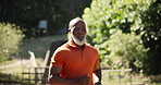 Fitness, health and senior black man in a park for running, training or morning cardio outdoor. Energy, wellness or elderly African runner in nature for body workout, exercise or sports performance