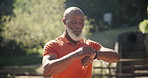 Senior fitness, running and black man with smartwatch in a park for wellness, training or morning cardio. Heartbeat, watch and African male runner in nature with pulse, calories or run steps check