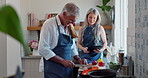 Old couple, cooking and tablet or online recipe in kitchen with raw vegetables or prepare, nutrition or dinner. Man, woman and internet search at stove or healthy lunch or retirement, bonding or food