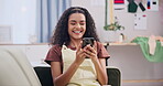 Woman, laughing and typing with phone on sofa for text message, social media post or internet meme in home. Person, smartphone and happy for mobile chat, notification or relax in living room of house