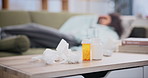 Pills, tissue and woman on sofa with water for hay fever, allergy or virus in living room. Female person, medicine and laying on couch with blanket for headache, covid 19 or flu infection at home