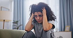 Woman, frustrated and depression on sofa in home with schizophrenia, mental health and burnout. Psychology, person and headache with anxiety, trauma and suffering on couch in living room with stress