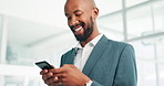 Happy, businessman and phone typing for social media, communication or online chatting at office. Black man or employee with smile on mobile smartphone in research, texting or networking at workplace