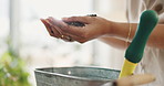 Woman, hand and soil in pot for garden, growth or natural sustainability in agriculture at home. Closeup of female person or gardener with wet sand, fertilizer or plant food in tin bucket at house 