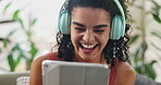 Woman, headphones and tablet or dancing to music for online entertainment for audio, streaming or subscription. Female person, singing and happy in apartment or hip hop radio, sound or technology