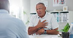 Senior, man and consulting doctor on chest pain, sore or discomfort in healthcare hospital. Mature, male person or patient talking to medical employee for heart ache, breathing or illness at clinic