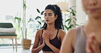 Woman, yoga and meditation in class for holistic wellness, exercise and healing in breathing exercise. People or friends with namaste, peace and prayer hands for mindfulness, mental health and calm