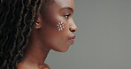 Face, paint and black woman with beauty on skin in studio and gray background with makeup on body. Girl, profile and profile with creative art or cosmetics for unique aesthetic and skincare in mockup