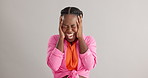 Anxiety, screaming and hands on face of black woman in studio with mental health crisis on grey background. Stress, shout and female model overthinking mistake, fail or frustrated, fear or disaster