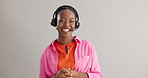 Customer support, call center and business black woman on gray background for help, contact or CRM service. Professional, telemarketing and person with headset talking for online consulting in studio