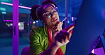 Woman, night and web development on computer, eyewear and ideas for programming or coding in office. Female person, thinking and reflection for website in neon light, project and planning in dark