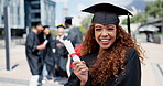 Face, school and graduation with black woman outdoor on campus of college of university. Portrait, education and success with happy young student laughing in celebration at certificate ceremony