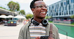 Phone, funny and happy man laughing outdoor with social media, chat or gif communication. University, education and African student at campus with smartphone, app or texting, meme or silly message