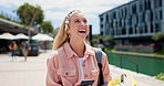 Funny, phone and happy woman laughing outdoor with social media, chat or gif communication. University, books and female student at campus with smartphone, app or texting, meme or silly message